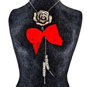 Handcrafted red bow silver rose and beads on leather like string